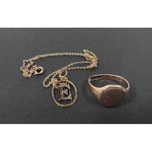 606 - A 9ct gold Gent's signet ring and a fine 9ct gold necklace and 'E' pendant, 5.8gms.