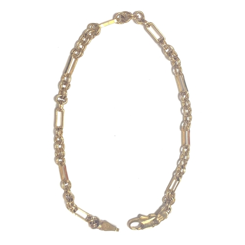 649 - A hallmarked 18ct gold bracelet formed from alternating long and triple links  4.1 gm