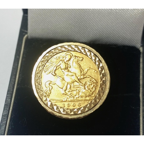 668 - An EVII half sovereign set in a 9 carat hallmarked gold ring, gross weight 9.9gm