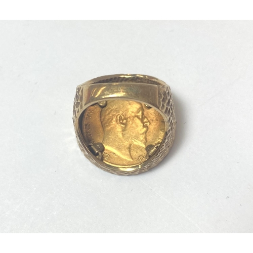 668 - An EVII half sovereign set in a 9 carat hallmarked gold ring, gross weight 9.9gm