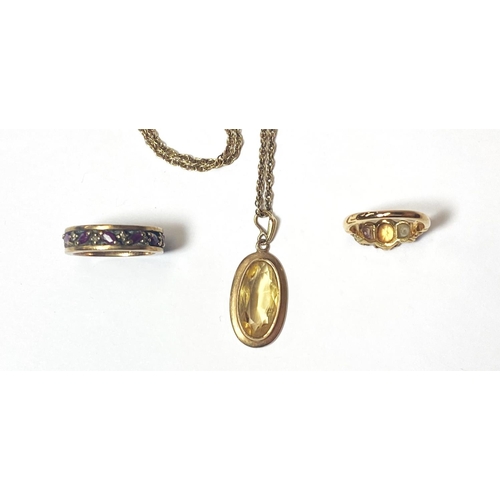 673 - A modern 9ct gold pendant set oval citrine, the chain marked 375, a dress ring set with 3 stones and... 