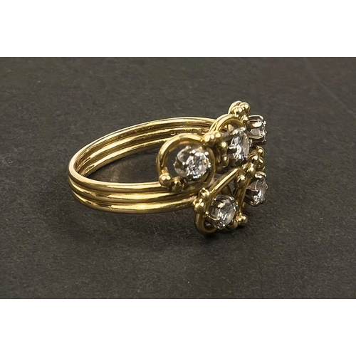 684 - An 18 carat hallmarked gold dress ring with 5 diamonds in scroll setting on ribbed shank, gross... 