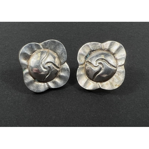 687 - A pair of white metal pierced earrings in the Georg Jensen style 89, but unmarked.... 