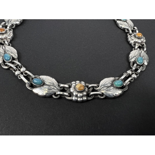 691 - Georg Jensen, an art nouveau style silver necklace originally designed in 1904, the links set with o... 