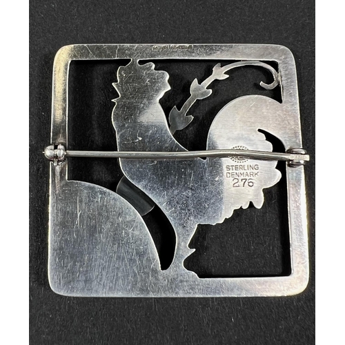 691A - Georg Jensen, a square silver brooch designed by Arno Malinowski, a cockerill behind a diagonal fron... 