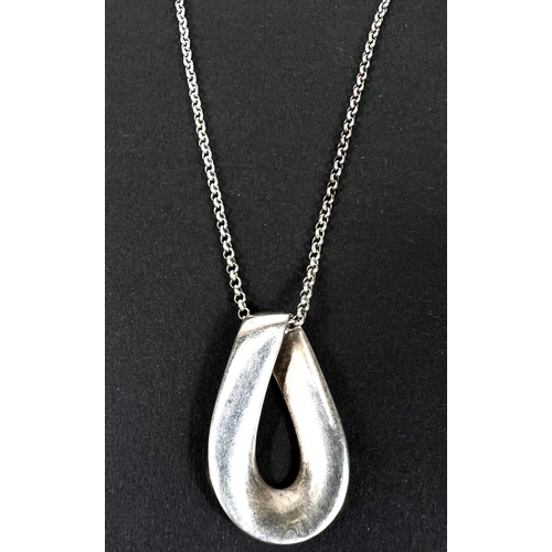 692 - Georg Jensen - an 'Infinity' pendant marked Georg Jensen 9255 Denmark designed by Regitze Overg... 