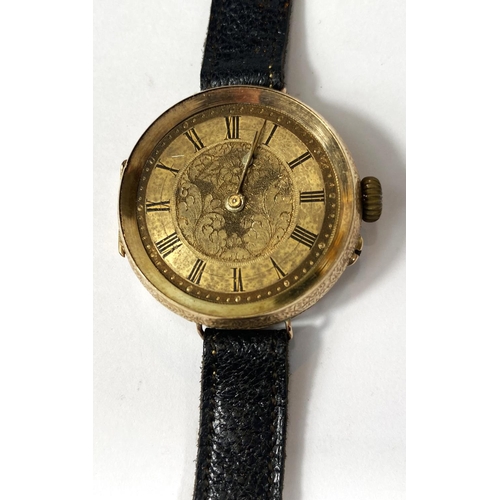 699 - An early 20th century traditional wristwatch with 14k mark to case, etched dial, Roman numerals, dia... 