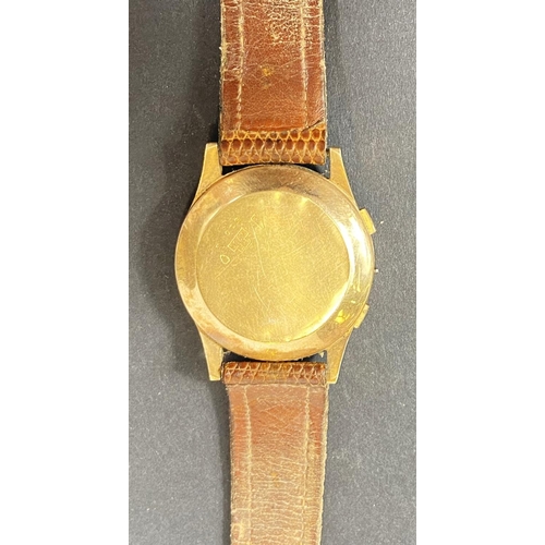 701 - An 18k stamped vintage chronograph wristwatch, Swiss movement (no winder) on leather strap, 37mm dia... 