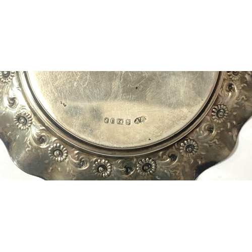 709 - A hallmarked silver dish with incised decoration and wavy border, Sheffield 1887, 2.9oz; a Japanese ... 