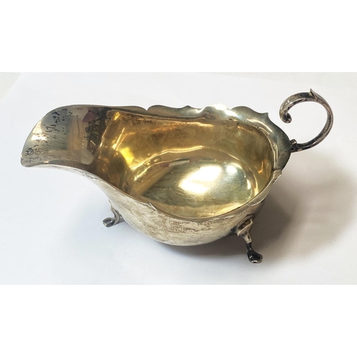 711 - A hallmarked silver sauce boat on hoof feet, Chester 1913, 2.6oz