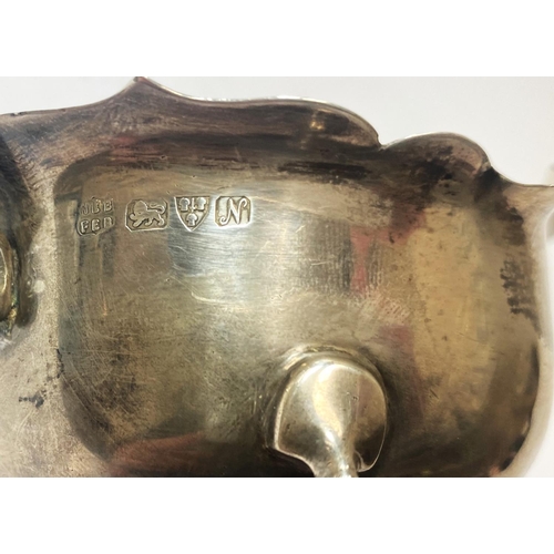 711 - A hallmarked silver sauce boat on hoof feet, Chester 1913, 2.6oz