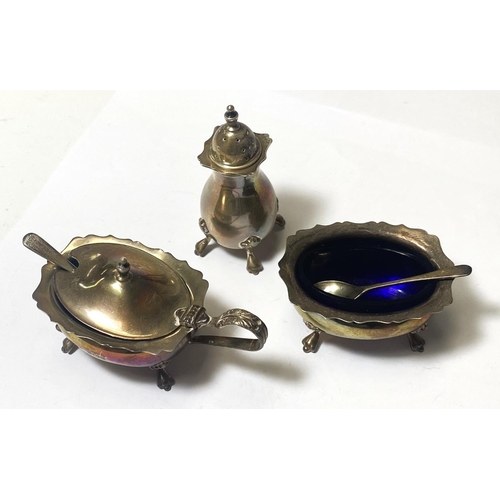 718 - A CRUET SET, silver, 3 pieces with spoons (one matched), 4.5oz