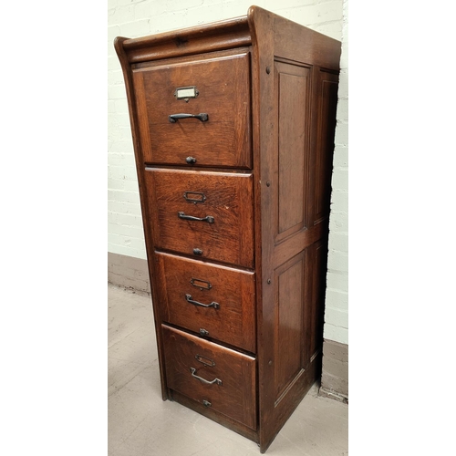 980 - A 1930's oak Kenrick and Jefferson 4 drawer office filing cabinet with quarter panelled sides, heigh... 