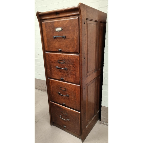 980 - A 1930's oak Kenrick and Jefferson 4 drawer office filing cabinet with quarter panelled sides, heigh... 