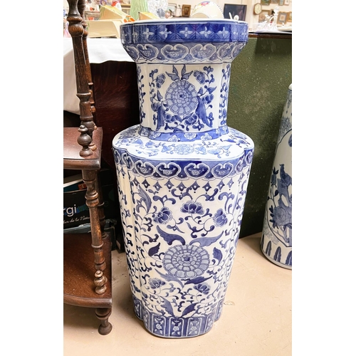 A very large blue and white Chinese floor standing vase with ...