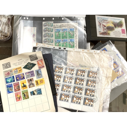 64 - A box of unsorted stamps, mainly foreign issue