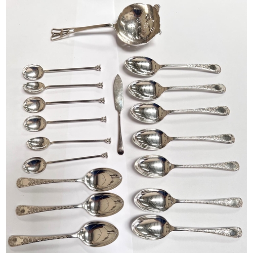 662 - A hallmarked silver sifter spoon; 10 hallmarked silver teaspoons with chased decoration; 6 hall... 