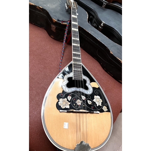 297A - A Middle Eastern Bouzouki with 1/2 melon body and inlaid decoration.