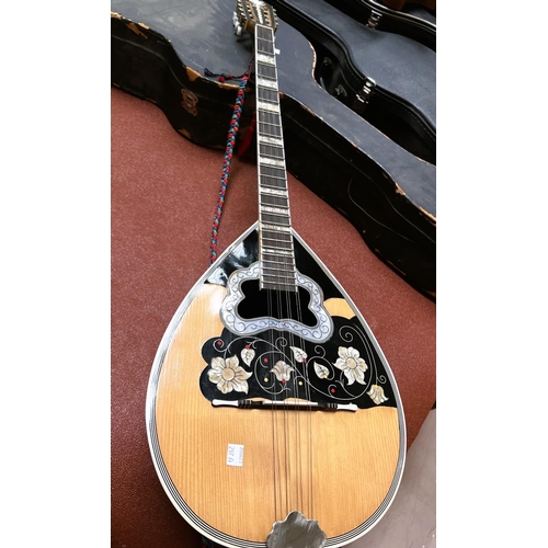 297A - A Middle Eastern Bouzouki with 1/2 melon body and inlaid decoration.