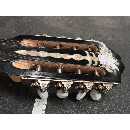 297A - A Middle Eastern Bouzouki with 1/2 melon body and inlaid decoration.