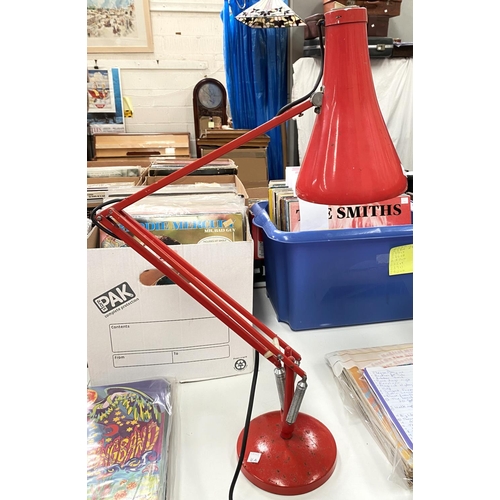 16A - A vintage red angle poise desk lamp.
