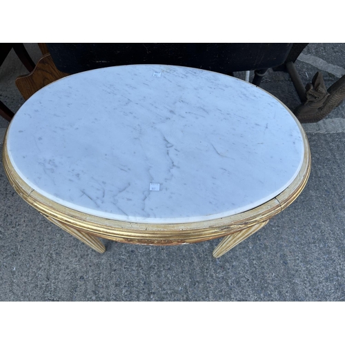 972 - A period style oval occasional table with marble insert and gilt frame