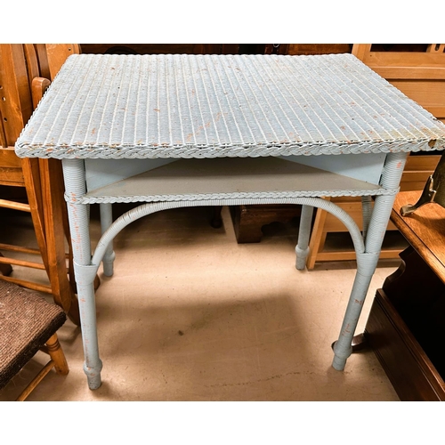 984 - A blue Lloyd Loom 2 tier occasional table; a mid 20th century veneered nest of tables