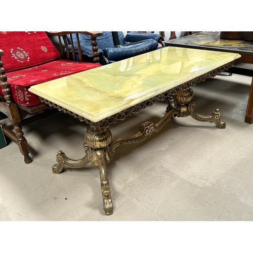 978 - A rectangular onyx and gilt coffee table