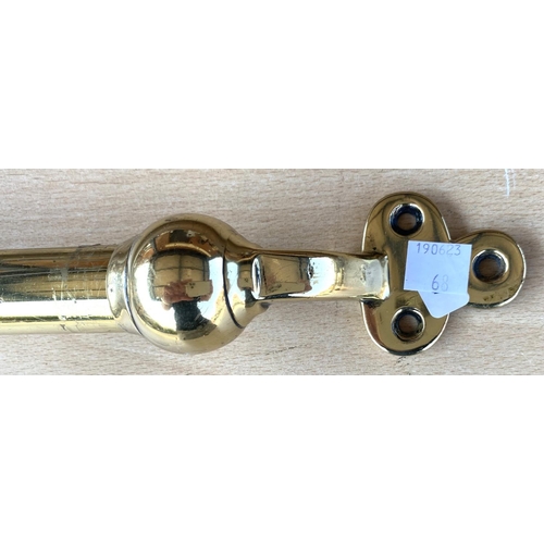 68 - BRASS CURTAIN RAIL with wall fixings at ends, 132cm and another with pineapple terminals, 225cm