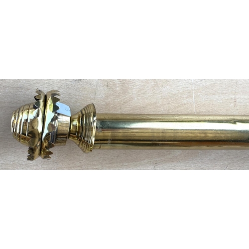 69 - BRASS CURTAIN RAIL, 260cm and another with wall fixings, (terminals a.f) 200cm