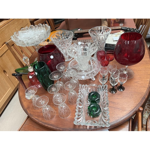 599 - A glass large 2 piece table centre; a cranberry bell; decorative glassware