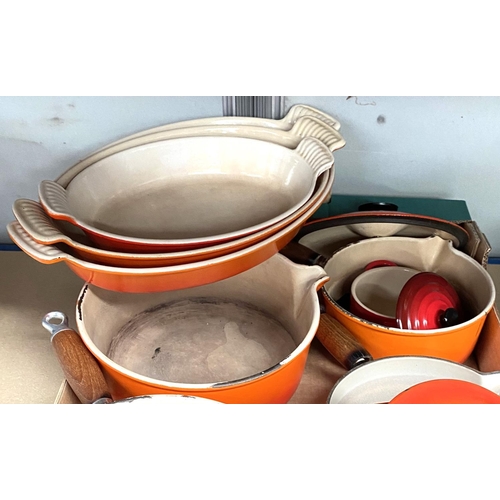 13 - A selection of Le Creuset, graduating oven dishes, lidded pans etc