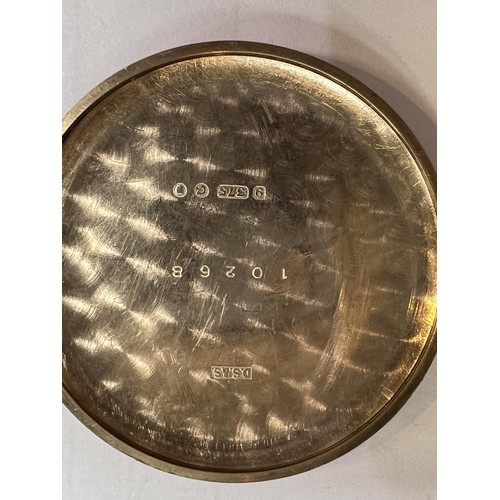 688B - IWC (International Watch Company): a 1950's oversized 9ct gold cased gents wrist watch with Arabic N... 