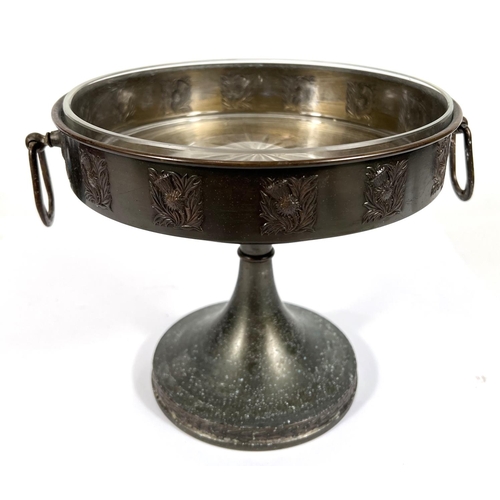 665 - A Danish Pewter Metawa table centure with glass interior, thistle relief decoration to the outside, ... 