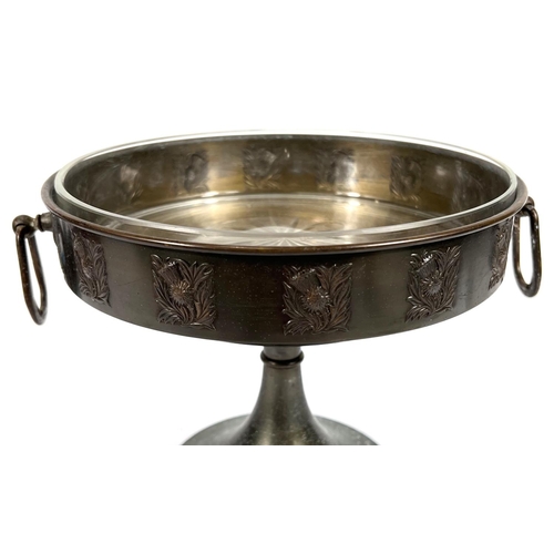 665 - A Danish Pewter Metawa table centure with glass interior, thistle relief decoration to the outside, ... 