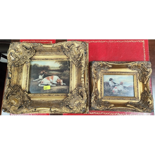 782 - A large gilt framed 19th century style textured print of Spaniels; another similar picture in gilt f... 