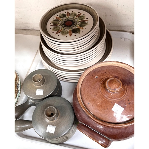 556 - A large selection of Denby dinner and tea ware including plates, soup dishes etc