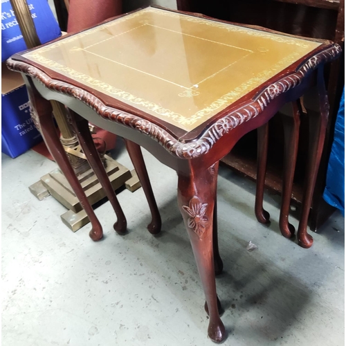 864 - A nest of 3 reproduction mahogany tables and another occasional table: a vintage gilt drinks trolley... 