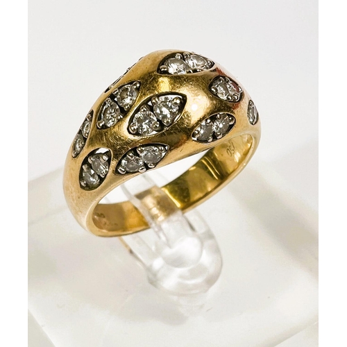 718 - An 18 carat hallmarked gold dress ring set with pairs of diamonds in 12 lozenge shaped insets, 24 di... 