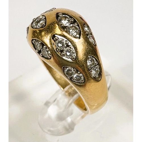 718 - An 18 carat hallmarked gold dress ring set with pairs of diamonds in 12 lozenge shaped insets, 24 di... 