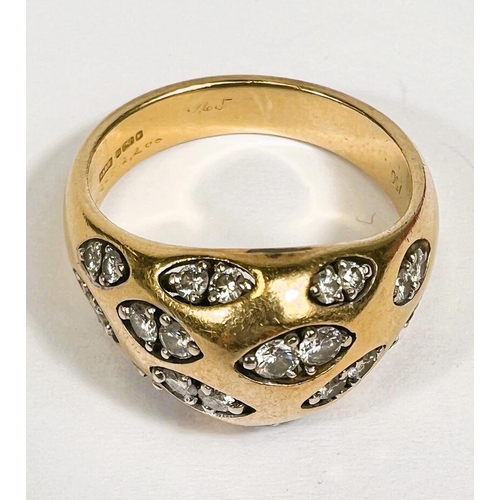 718 - An 18 carat hallmarked gold dress ring set with pairs of diamonds in 12 lozenge shaped insets, 24 di... 