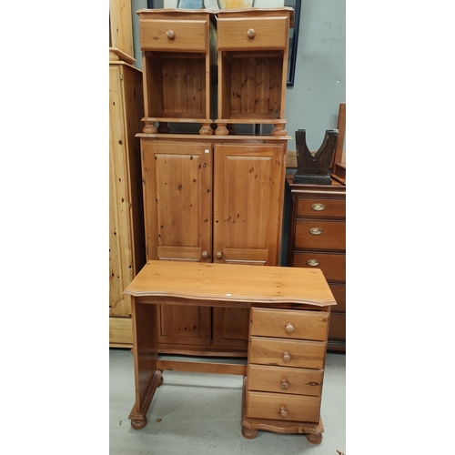 820 - A modern pine 4 piece bedroom suite comprising gents' double door wardrobe, dressing tale, stool and... 