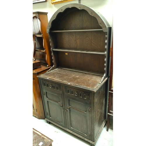 831 - An oak reproduction Dutch dresser with 3 shelves, 2 height and double cupboard/drawers, width 94cm