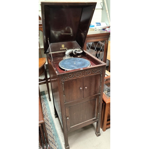 832 - An Academy windup gramophone in mahogany floor standing case