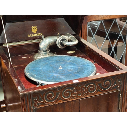 832 - An Academy windup gramophone in mahogany floor standing case