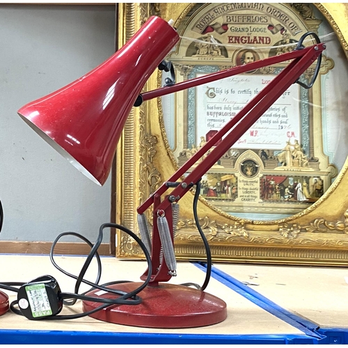 101 - A pair of unusual matched angle poise lamps in red finish
