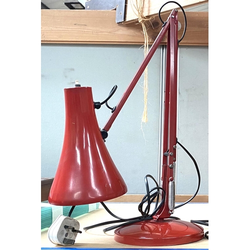 101 - A pair of unusual matched angle poise lamps in red finish