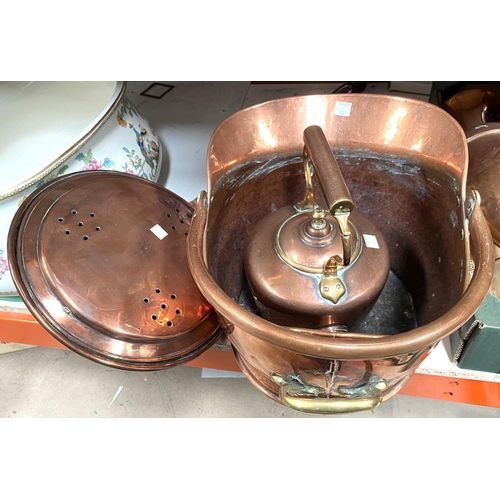 109 - A 19th century copper coal scuttle and warming pan; a copper kettle