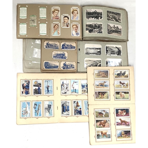 131 - A selection of cigarette cards:  Park Drive Navy set 48; Senior Service holidays 44; Britain se... 