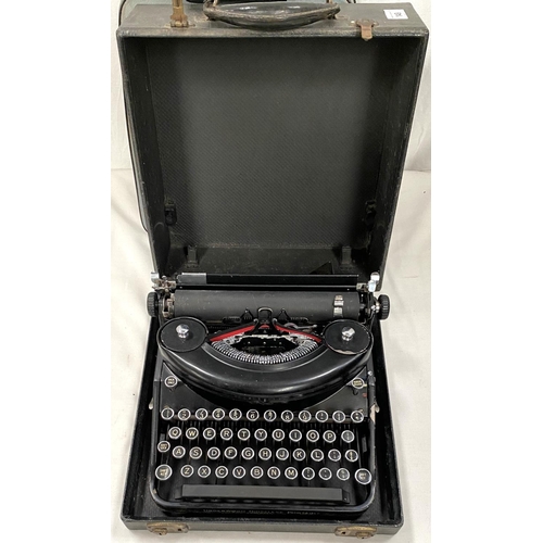 149 - A pre-WWII portable typewriter by Underwood; another by Olivetti